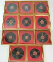 Eleven Vintage Victrola Records in Well-Constructed Gilded Frames. All are glass covered with wall