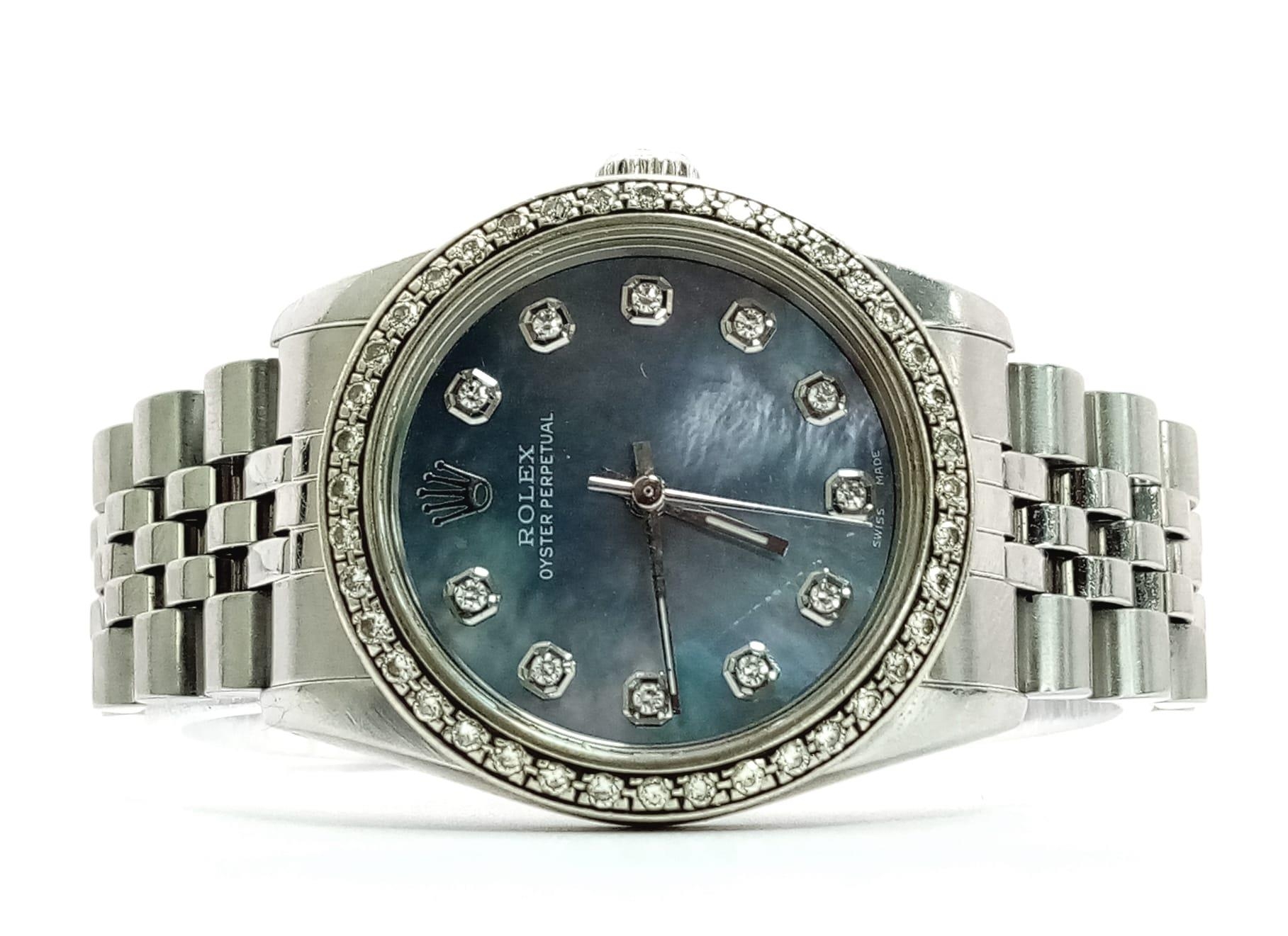 A LADIES ROLEX DRESS WATCH WITH DIAMOND NUMERALS AND BEZEL , MOTHER OF PEARL DIAL AND AUTOMATIC - Image 6 of 10
