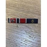 A WW2 German Medal Bar with Iron Cross, 1st and 2nd Class Bar and Wound Badge Bar. ML533