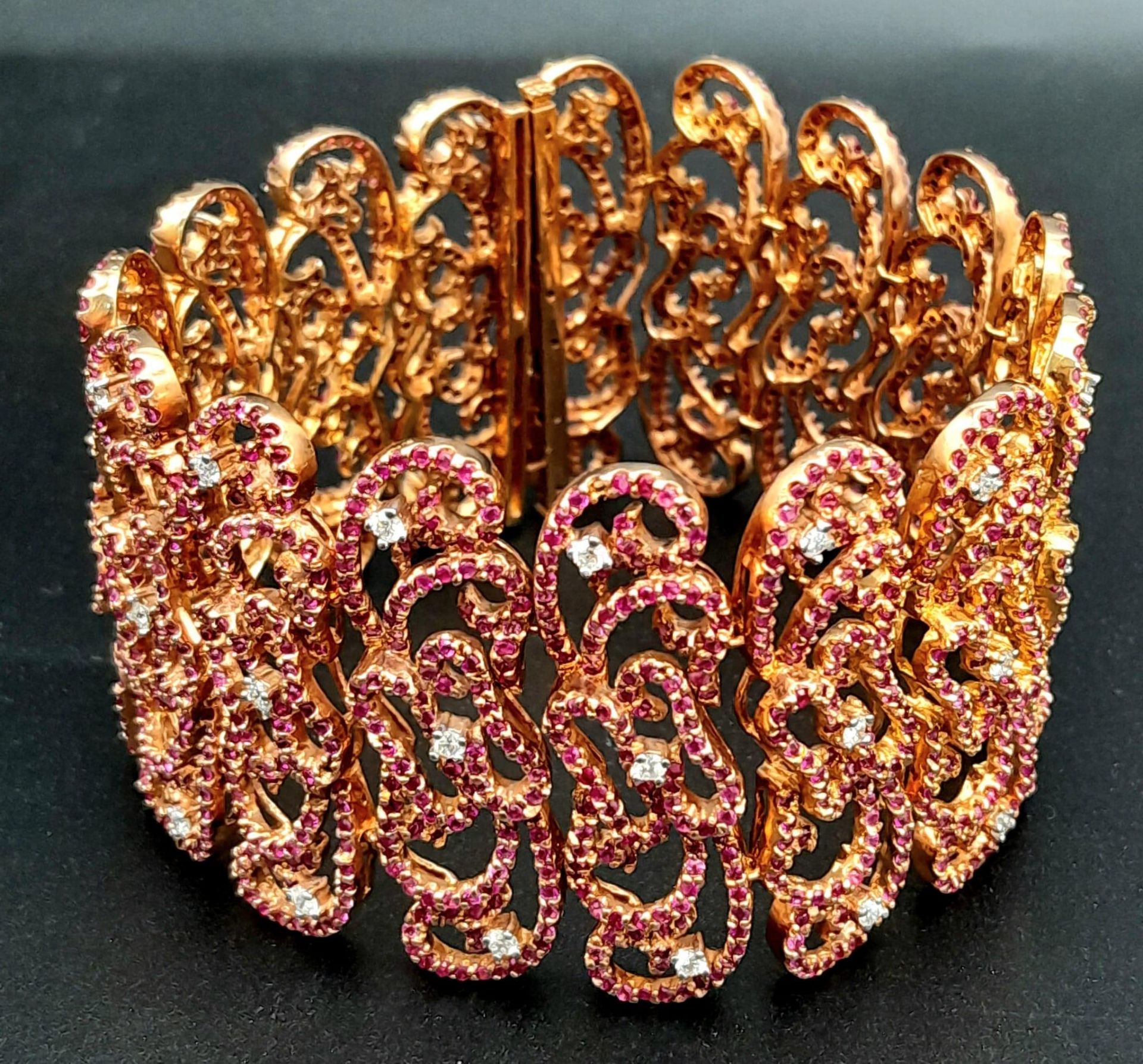 An 18K Rose Gold Ruby and Diamond Statement Bracelet. Interlocking ruby encrusted seahorse links - Image 2 of 6