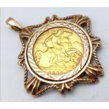 A 9 K yellow gold pendant with a King George V sovereign, total weight: 7.7 g