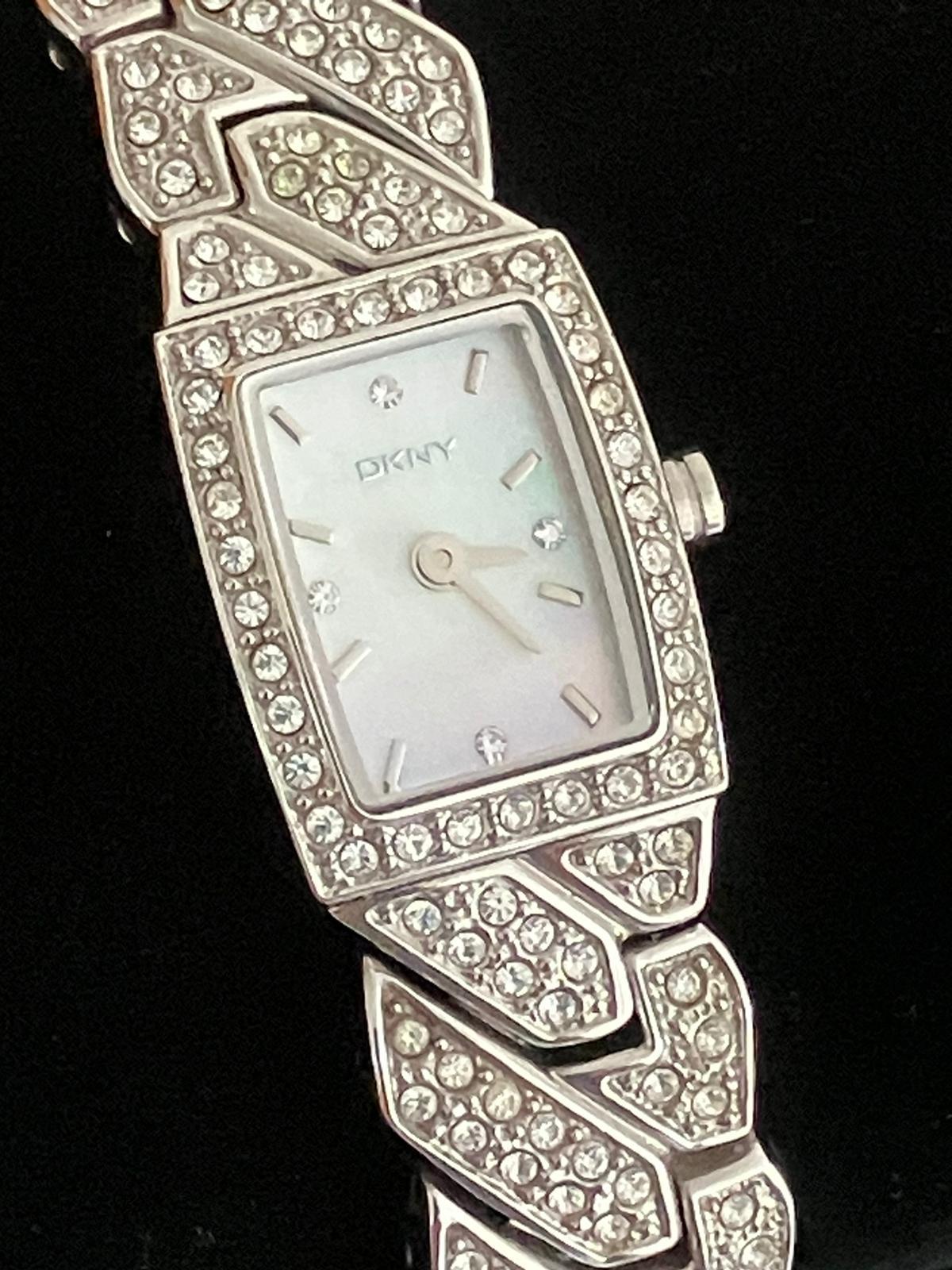 Ladies DKNY Wristwatch. Model NY-4411. Finished in silver tone stainless steel with jewelled bezel