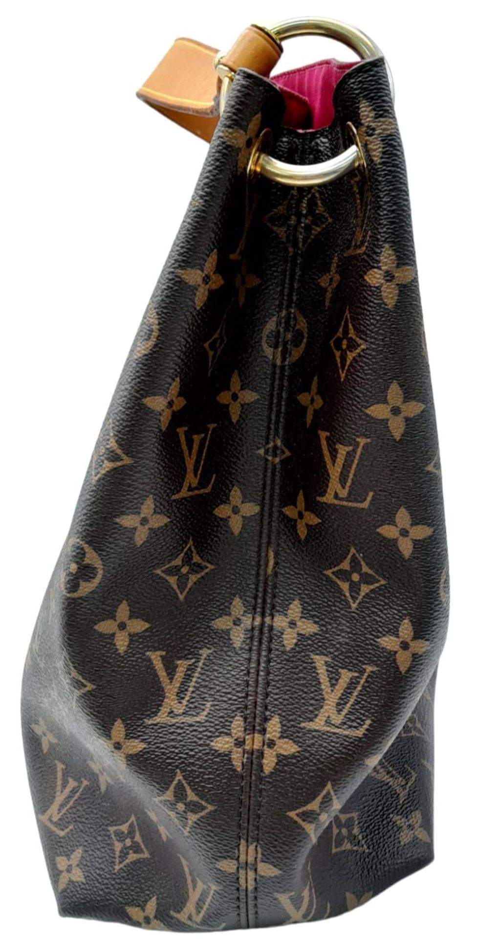 Louis Vuitton Graceful Hobo Bag. In classic Monogram canvas, this extra-roomy yet lightweight bag - Image 7 of 21