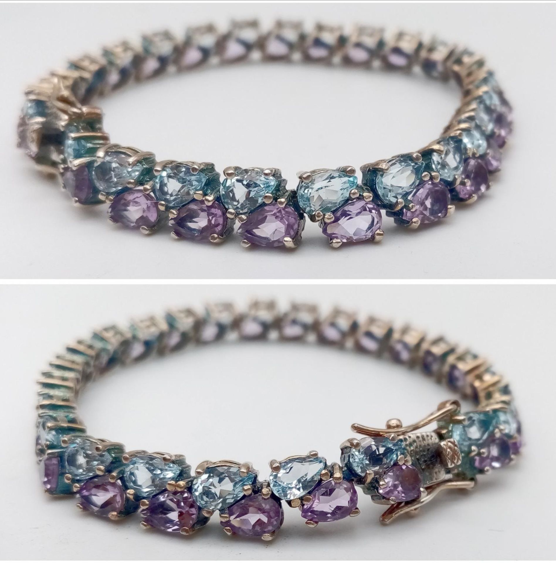 A Sterling Silver, double row bracelet set with Amethyst and Topaz. Measures 20cm in length. Weight: - Image 3 of 10