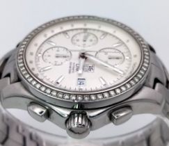A gents TAG HEUER - LINK automatic watch with diamond set bezel. Stainless steel construction, 42 mm