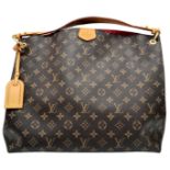 Louis Vuitton Graceful Hobo Bag. In classic Monogram canvas, this extra-roomy yet lightweight bag