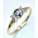 A 9K Yellow Gold, Blue Spinel and Diamond Ring. Spinel - 0.36ct. Diamond - 0.040ctw. Comes with a