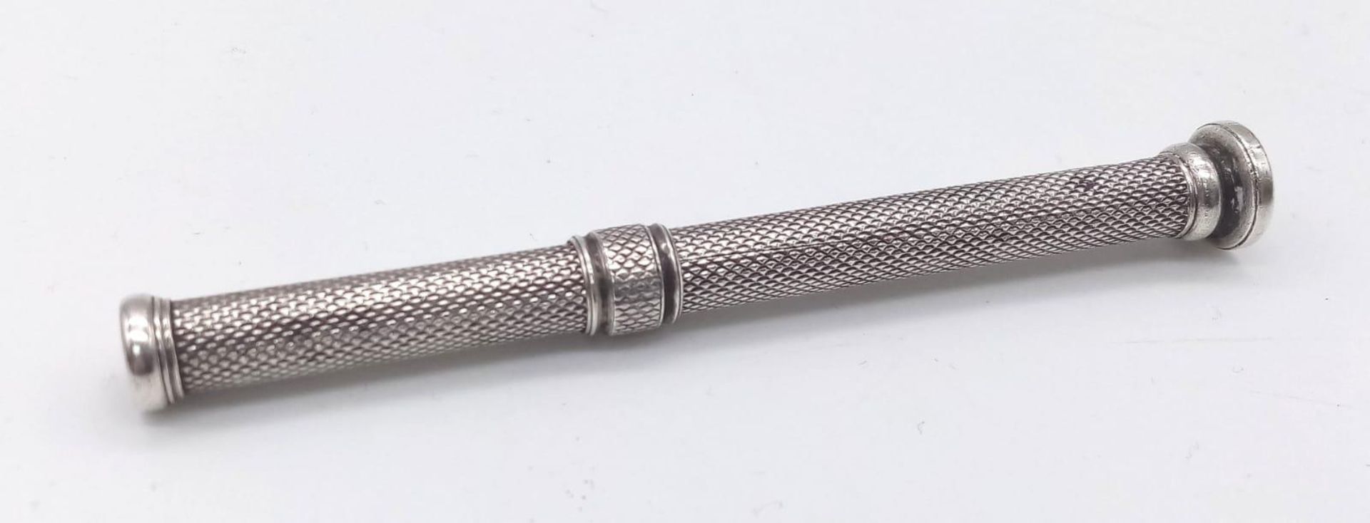 SAMPSON MORDAN & CO (1830-1845) Sliding Silver Propelling Pencil. A mid 19th century silver pencil