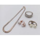 A varied collection of Sterling Silver Jewellery. Featuring two pairs of Pearl earrings, one pink