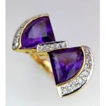 A Fabulous 18K Yellow Gold, Diamond and Amethyst Ring. The perfect bow tie with deep purple amethyst