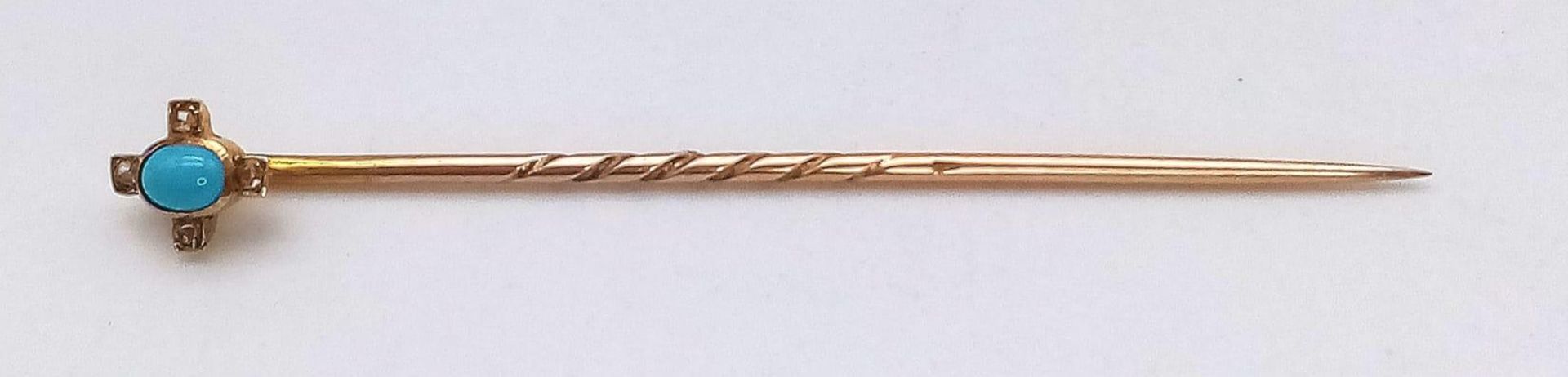 A Vintage 9K Yellow Gold Turquoise and Diamond Stick-Pin. Small turquoise cabochon with a four