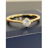 18 carat GOLD and DIAMOND SOLITAIRE RING. Originally purchased in Dubai and comes complete with