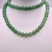 Beaded Jade Necklace. Measures 60cm in length.