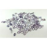 A lot of 23 Ct Faceted Tiny Amethyst Gemstones in Mix Shapes.