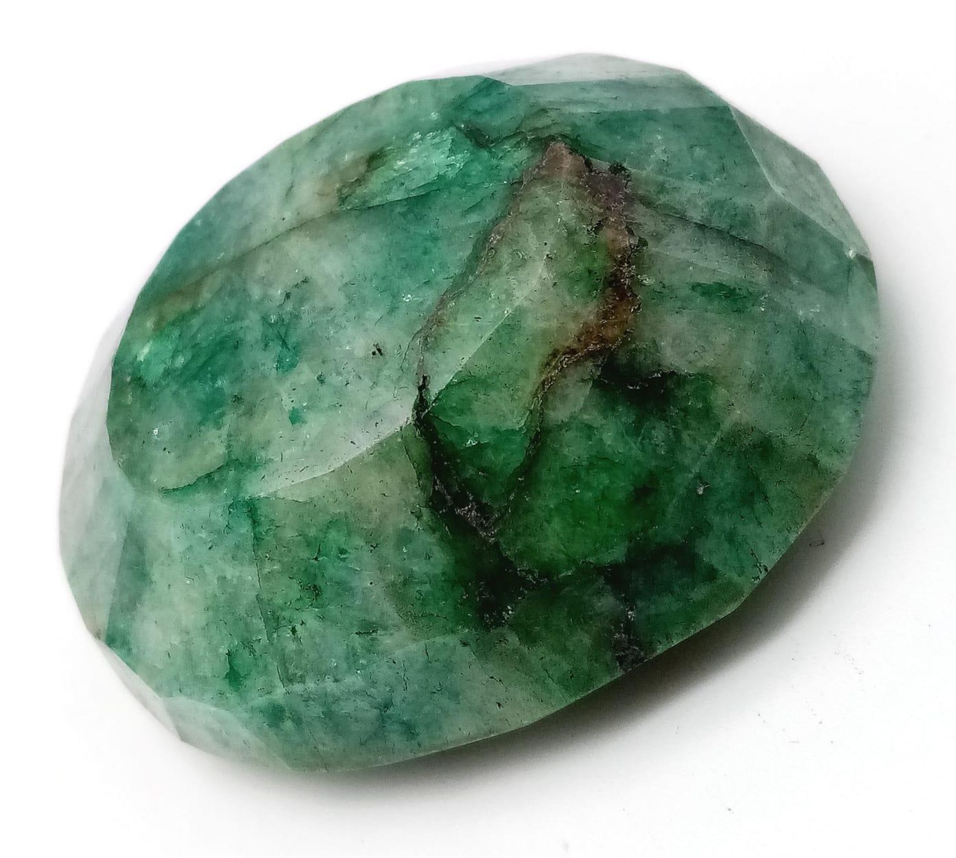 A 447ct Natural (Beryl) Emerald. Cushioned Mix-Cut. Comes with a GLI certificate.