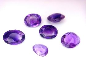 A PARCEL OF 6 OVAL AMETHYSTS TOTAL WEIGHT: 3.1g 15.4CT ref: A/S 6002