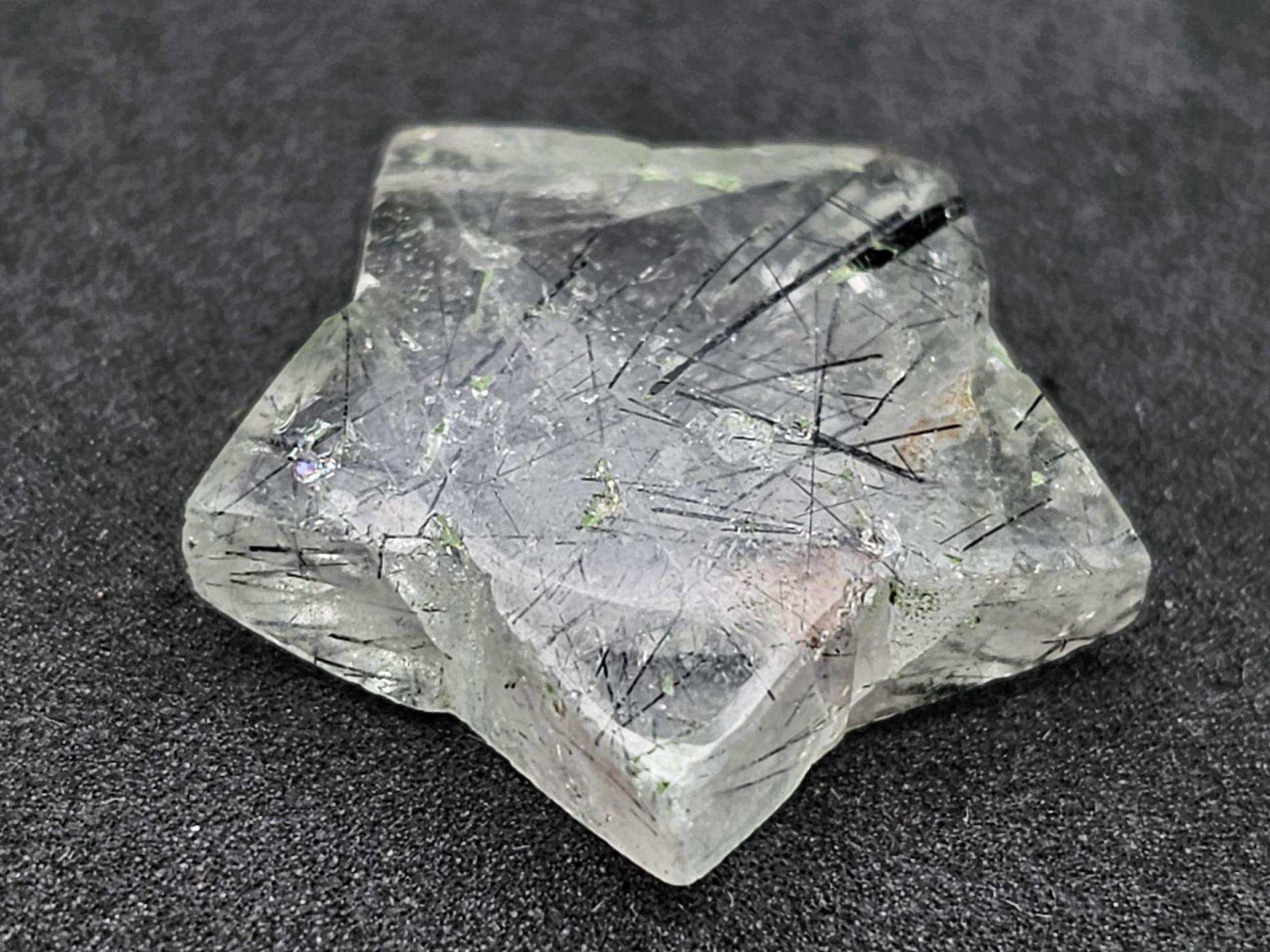 An uniquely star cut, natural RUTILATED QUARTZ, dimensions: 25 x 24 x 7 mm, weight: 28.6 g. Rare &