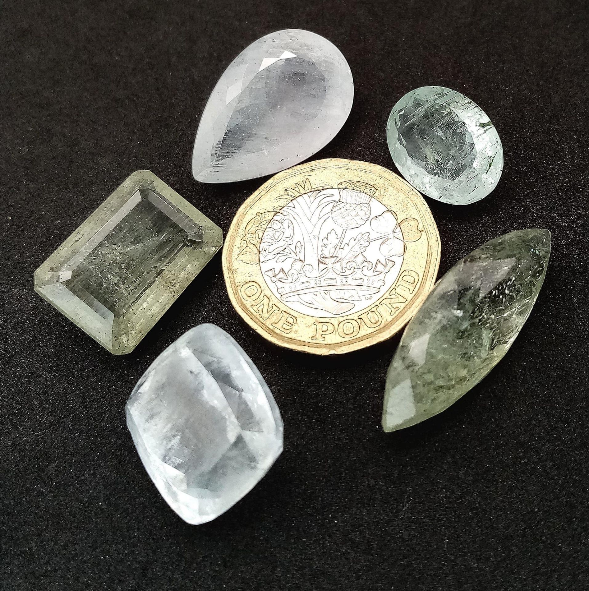 A Parcel of Five Aquamarine Gemstones - 67.5ctw. Different shapes. - Image 3 of 3