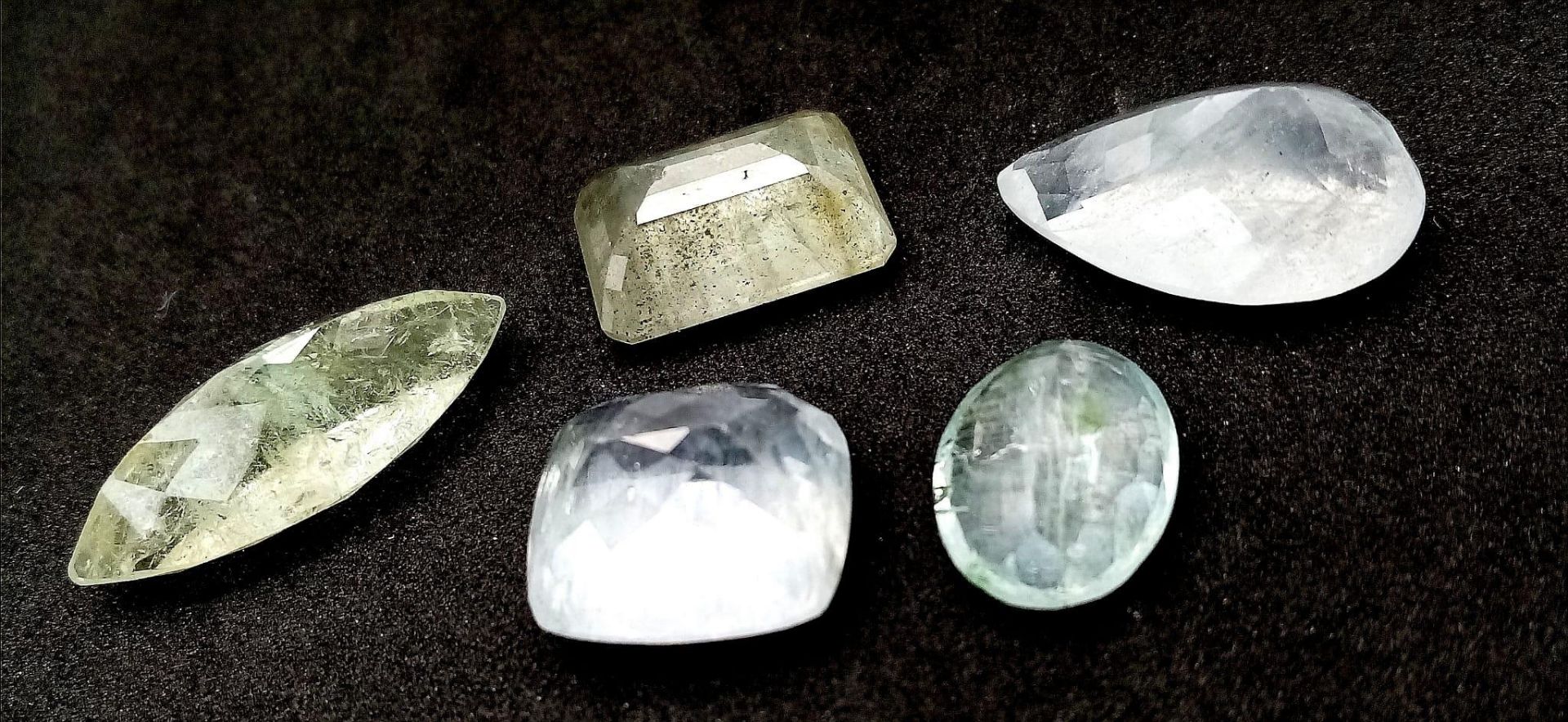 A Parcel of Five Aquamarine Gemstones - 67.5ctw. Different shapes. - Image 2 of 3