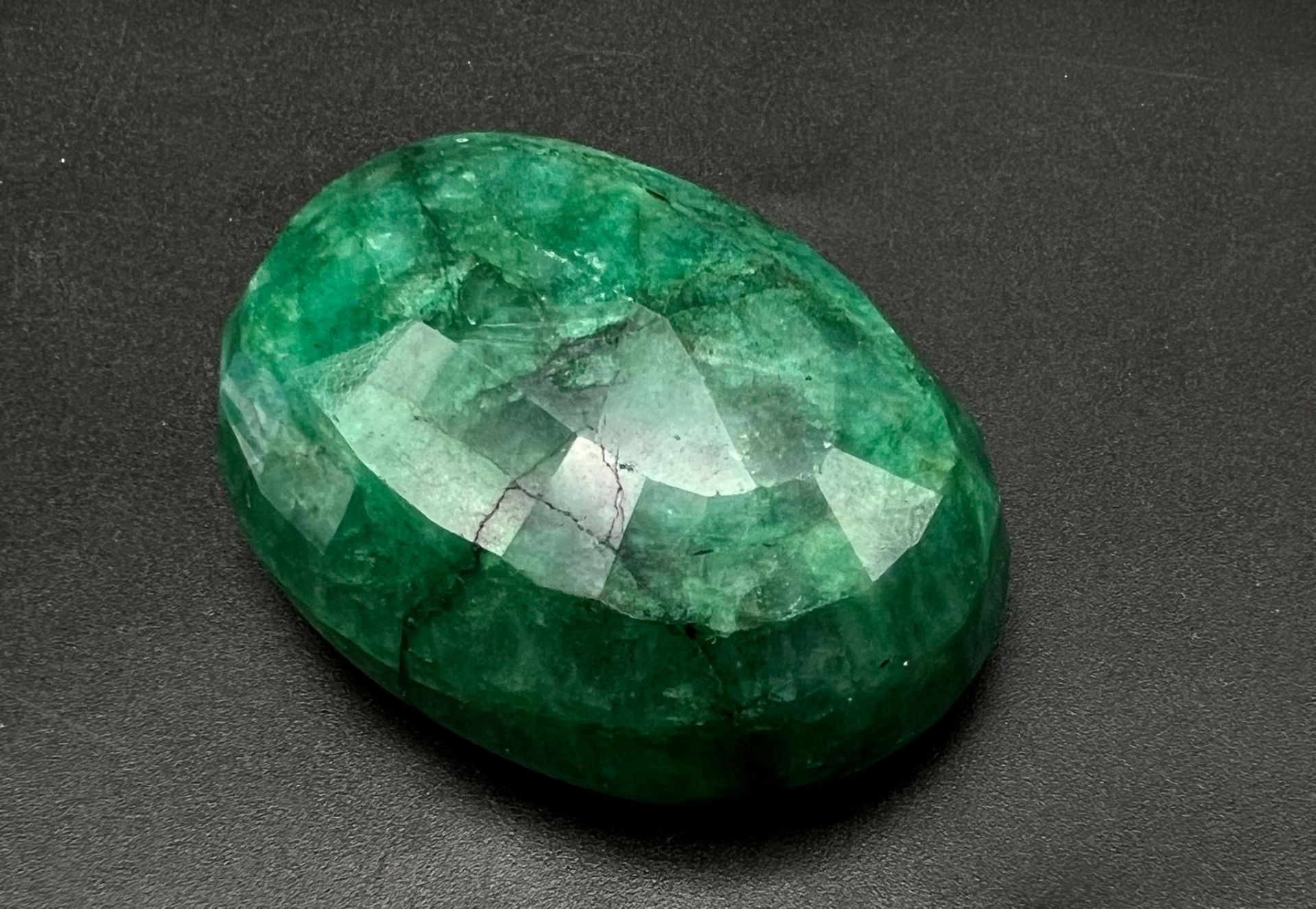 A 386.20ct Natural, Oval shaped, Earth Mined Emerald. Comes with GLI Certificate. - Image 2 of 3