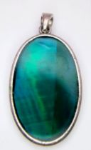 Oval Green Stone Pendant. Measures 4cm in length.