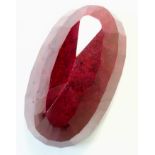 A Humongous 6230ct Earth-Mined African Ruby. Oval Shape with a GLI Certificate. This is a colour-