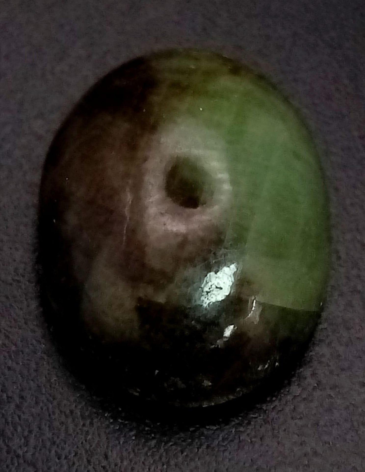 A 14.05ct Natural Untreated African Blue Sapphire, in Oval Cabochon shape. Comes with the GLI - Image 2 of 5