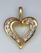 A 18K YELLOW GOLD DIAMOND SEY HEART PENDANT 0.20CT 2.1G 12mm x 17mm ref: 3168