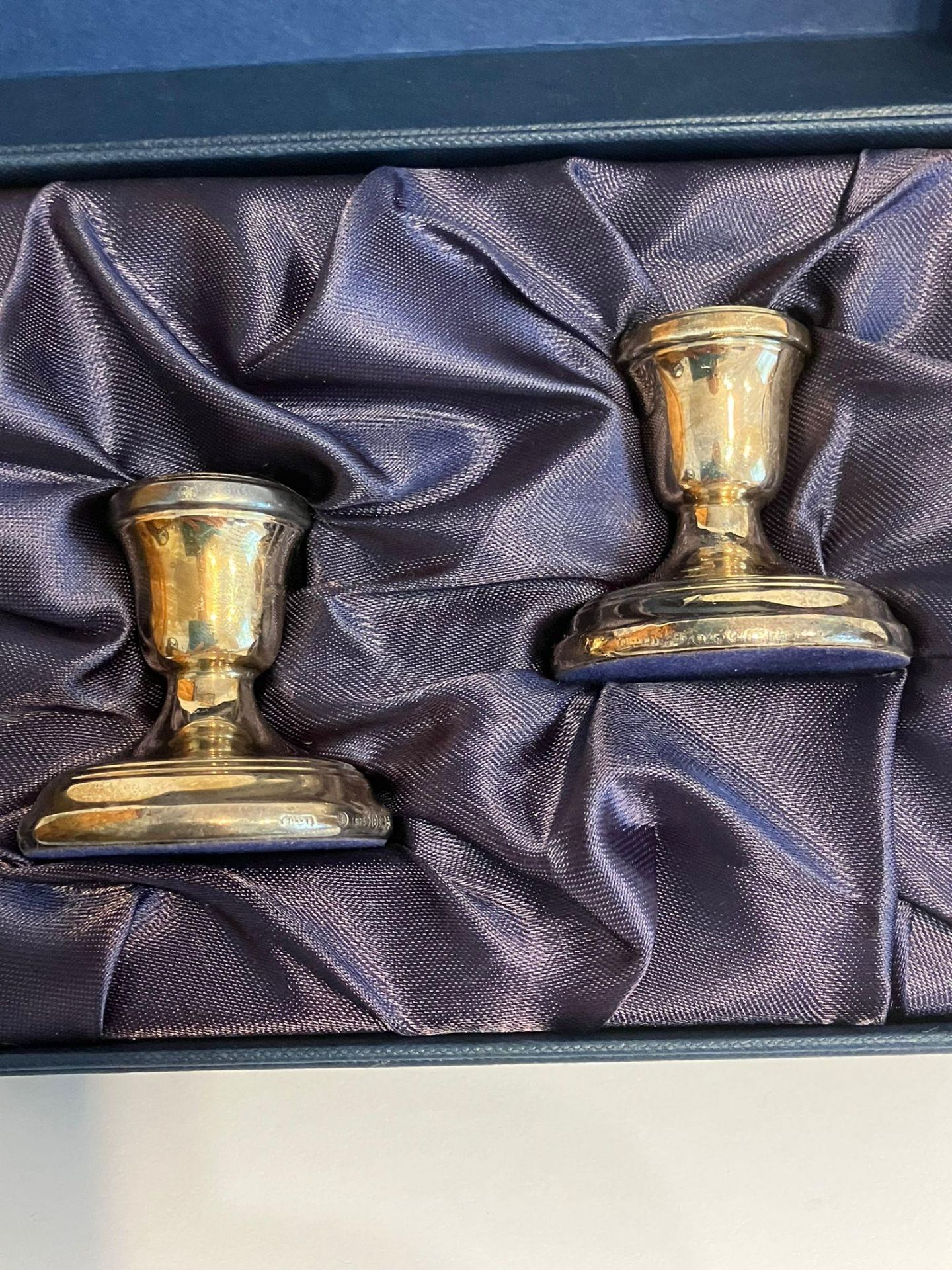 Pair of SILVER CANDLESTICKS in gift box. Condition as new.