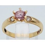 14k yellow gold trilogy ring set with pink and white CZ stones , 1.7g, size K