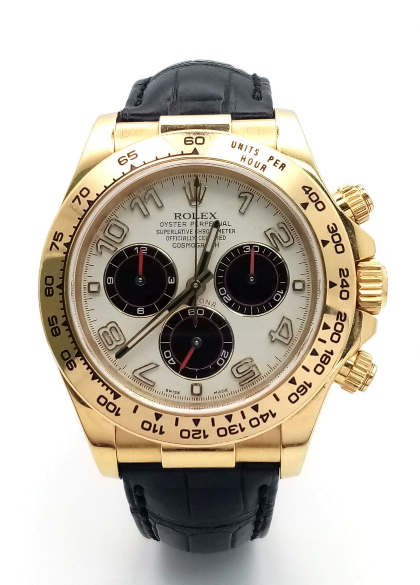 A Rolex Daytona Chronograph Panda 18K Gold Gents Watch. Black leather strap with Rolex gold clasp.