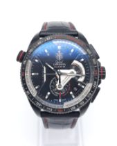 A Tag Heuer Carrera Calibre 36 Gents Watch. Black leather strap. Stainless steel case - 44mm.