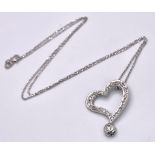 An 18K White Gold and Diamond Heart Pendant on an 18K White Gold Disappearing Necklace. 2.5cm