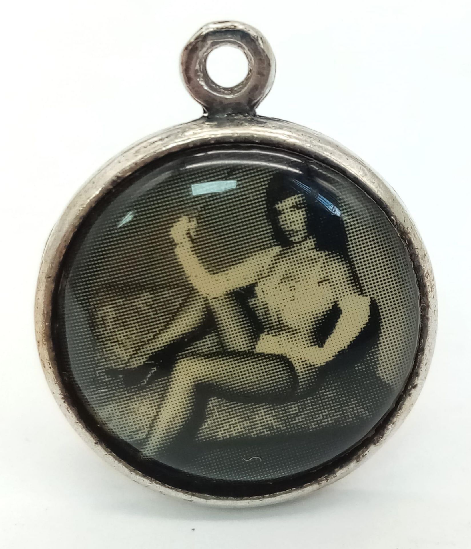 A Rare, Vintage Erotic Photographic Image Silver Pendant. Size: 2cm Diameter.