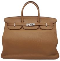 A gorgeous Hermes Togo Taupe Birkin Bag. A highly sought-after classic, quality leather