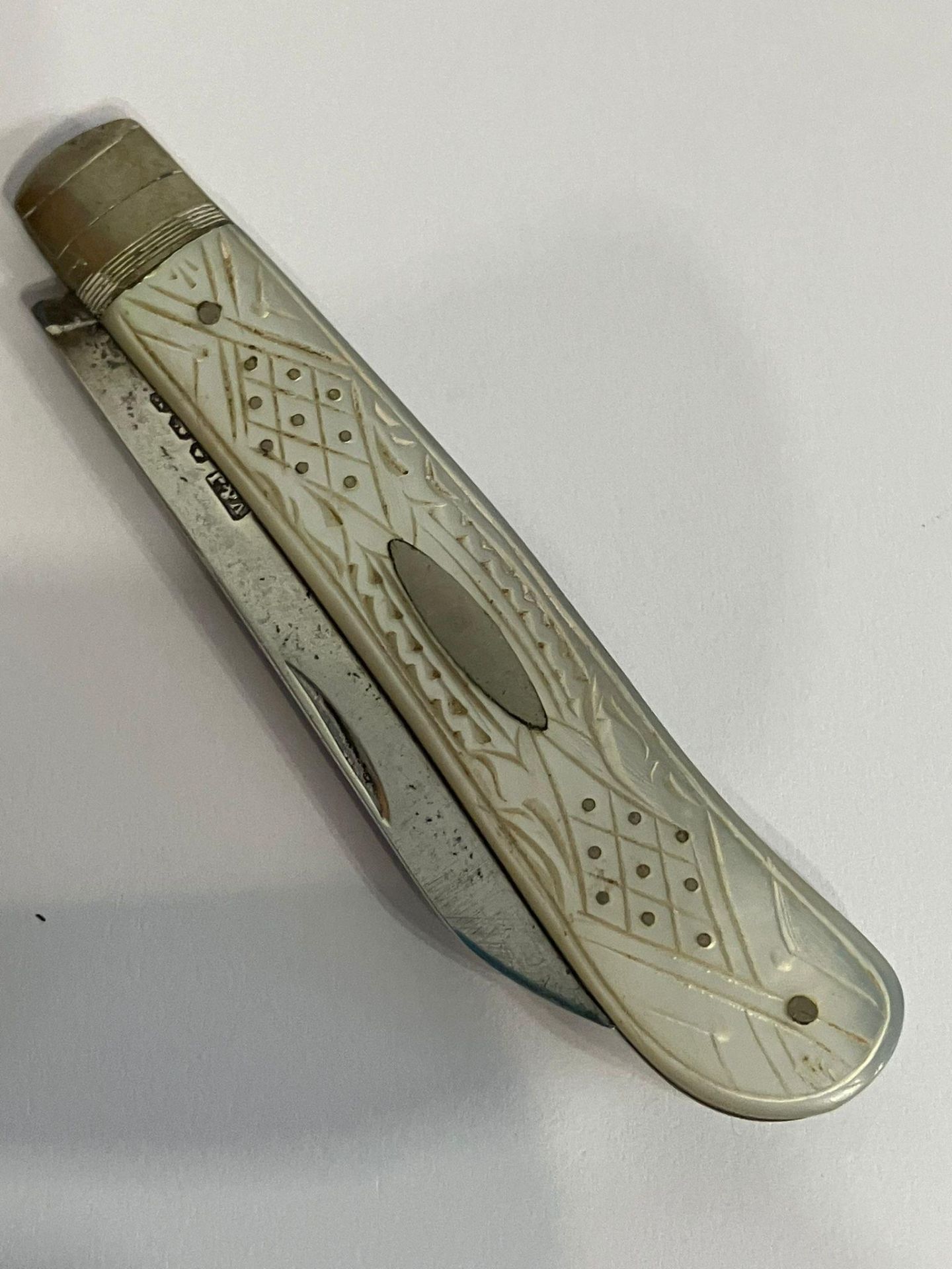 Antique SILVER BLADED FRUIT KNIFE With beautifully decorated mother of pearl handle. Having clear