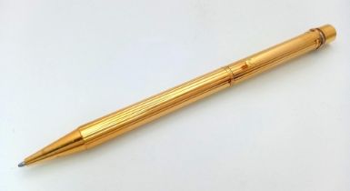 A Cartier Santos Gold Plated Ballpoint Pen. In good condition and working order. Ref: 14893