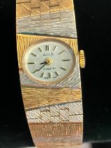 Ladies Beautiful vintage AVIA BRACELET WATCH. Finished in gold and silver tone. Face showing