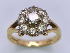AN 18K YELLOW GOLD DIAMOND CLUSTER RING. SIZE K, 0.65CTW, 3.6G TOTAL WEIGHT. Ref: SC 7020