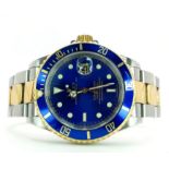 A Classic Rolex Oyster Bi-Metal Submariner Gents Watch. 18K Gold and stainless steel bracelet and