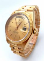 A Solid 18K Gold Rolex Oyster Perpetual Day-Date Gents Watch. 18k gold bracelet and case - 36mm.
