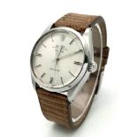 A Vintage Rolex Air King Precision Gents Watch. Brown leather strap. Stainless steel case - 35mm.