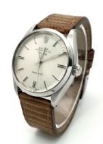 A Vintage Rolex Air King Precision Gents Watch. Brown leather strap. Stainless steel case - 35mm.