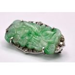 A Wonderful Art Deco Platinum, Diamond and Jade Brooch. A Chinese green and white pierced decorative