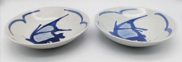 A pair of Chinese 1920's hand-painted bowls. Both marked on the bottom, measure 19cm wide and with a