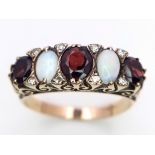 A Hand-Made Victorian Yellow Gold Garnet and Opal Five Stone Ring. Scroll pattern sides. Size U. 5.