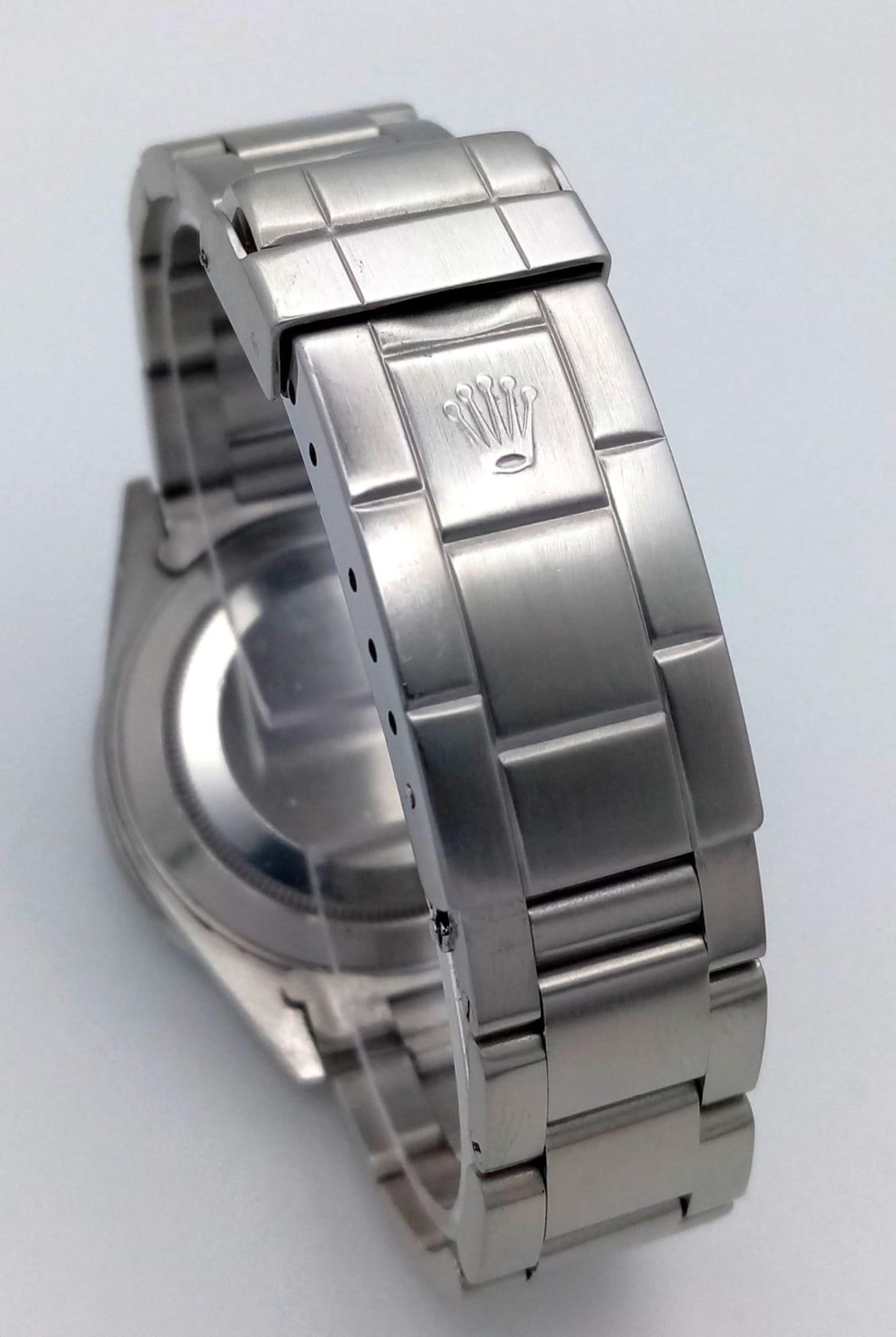 A Rolex Oyster Submariner Gents Watch. Stainless steel bracelet and case - 40cm. Black dial with - Image 5 of 7