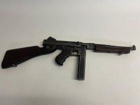 A Rare Deactivated USA WW2 Thompson M1A1 Sub Machine Gun. Moving bolt under spring pressure.