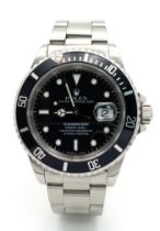 A Rolex Oyster Submariner Gents Watch. Stainless steel bracelet and case - 40cm. Black dial with