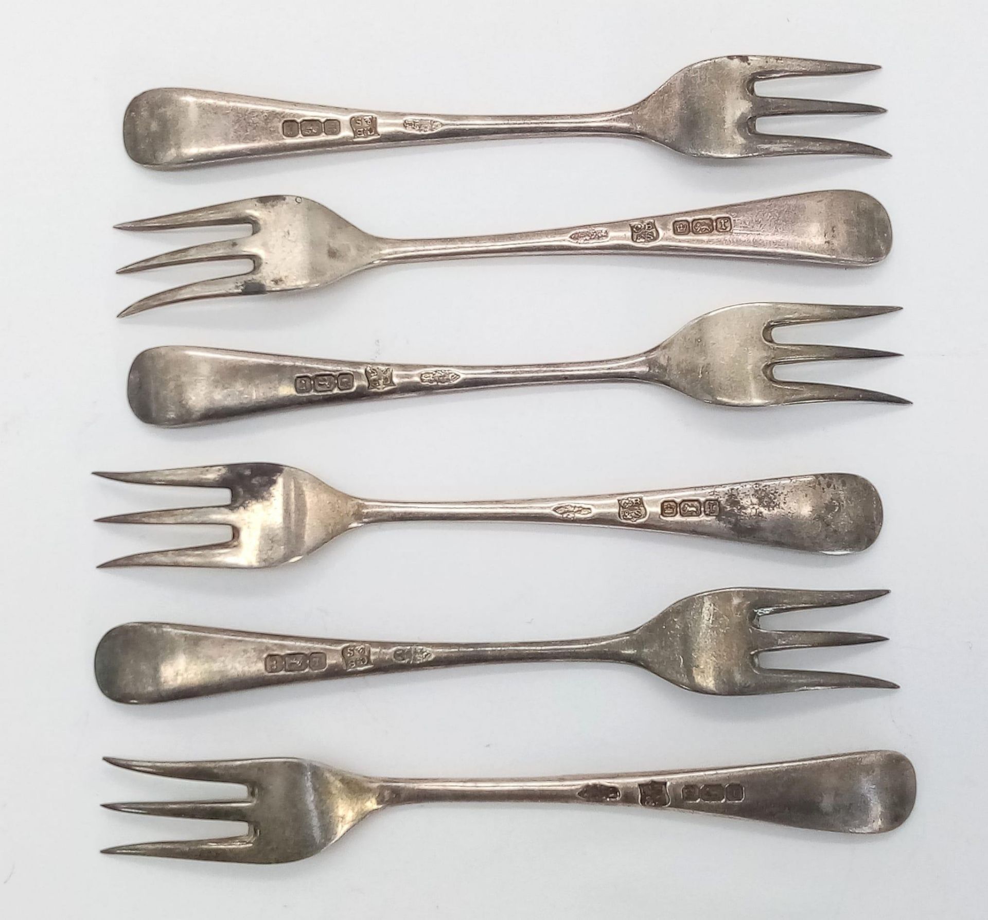 A set of 6 Antique sterling silver dessert forks with nicely ornate decoration on the body. Full - Image 2 of 4